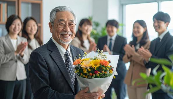 定年退職するベテラン社員 定年退職するベテラン社員の写真