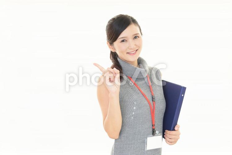 指さすビジネスウーマン 女性,ビジネスウーマン,仕事の写真素材