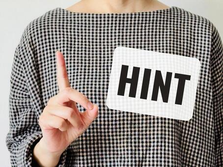 ヒントを出す女性 ヒント,女性,人差し指の写真素材