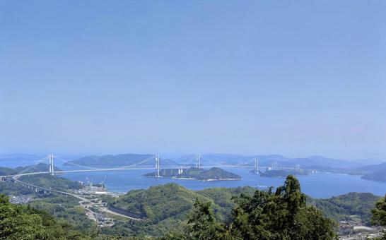 緑の丘から望む海の道 緑の丘から望む海の道 しまなみ海道,晴天,イメージの写真素材