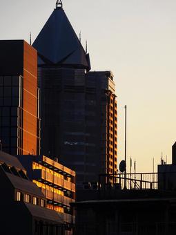 NEXTの NEXTの next,高層ビル,夕焼けの写真素材