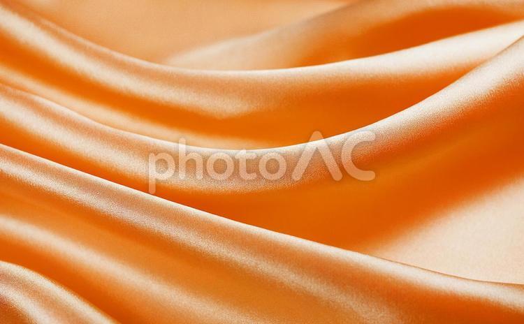 オレンジシャーベットカラーのシルクサテン サテン,シルクサテン,つるつるの写真素材