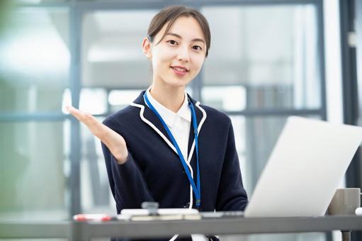 A woman posing for reception and guidance at the office A woman posing for reception and guidance at the office