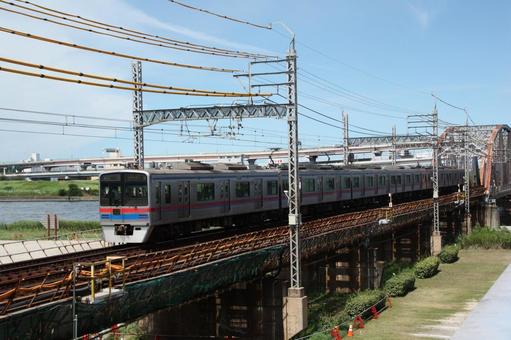 Railway crossing the bridge (Keisei 3000 series), JPG