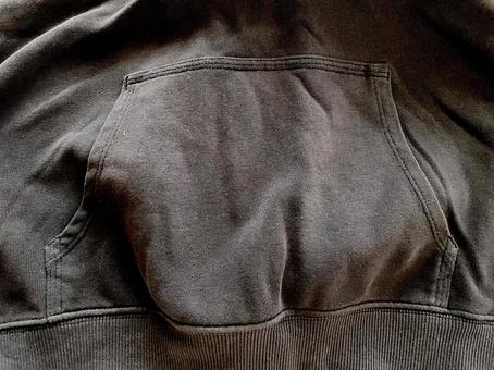 黒いパーカーのポケット ポケット,背景,黒の写真素材