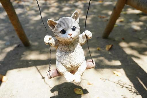 Cat on a swing, JPG