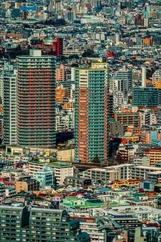 色鮮やかな高層住宅群 色鮮やかな高層住宅群 タワーマンション,高層ビル,住宅地の写真素材
