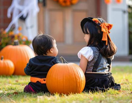 ハロウィンの仮装をした姉妹 ハロウィンの仮装をした姉妹の写真