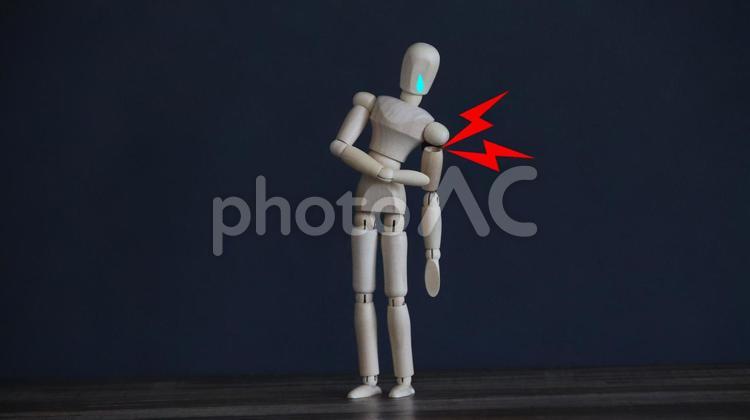 肩がはずれた 痛み,激痛,ケガの写真素材