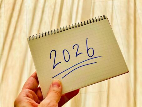 2026と書かれたノートを持つ手元2 2026,西暦,2026年の写真素材