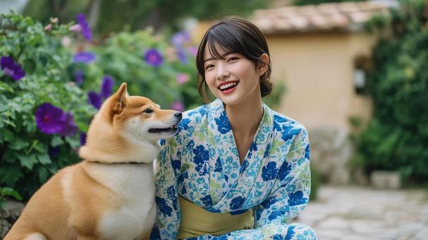 浴衣を着た女性と柴犬と朝顔 浴衣を着た女性と柴犬と朝顔の写真