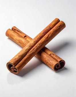 白い背景にシナモンスティック 白い背景にシナモンスティックの写真