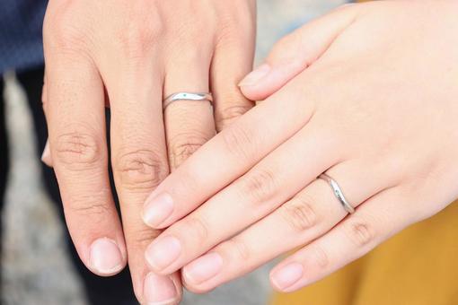 Newlyweds wearing wedding rings Newlyweds wearing wedding rings