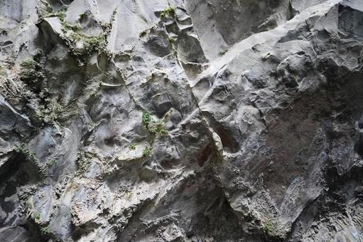 荒々しい岩肌の壁のテクスチャ 荒々しい岩肌の壁のテクスチャ 岩肌,岩壁,洞窟の写真素材