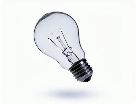 斜めに浮いている電球 斜めに浮いている電球の写真