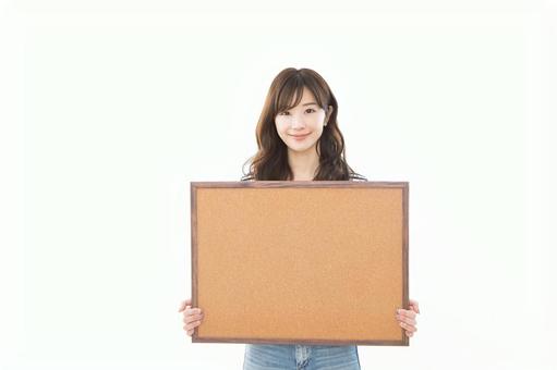 若い女性 メッセージボード 若い女性 メッセージボード 女性,人物,メッセージボードの写真素材