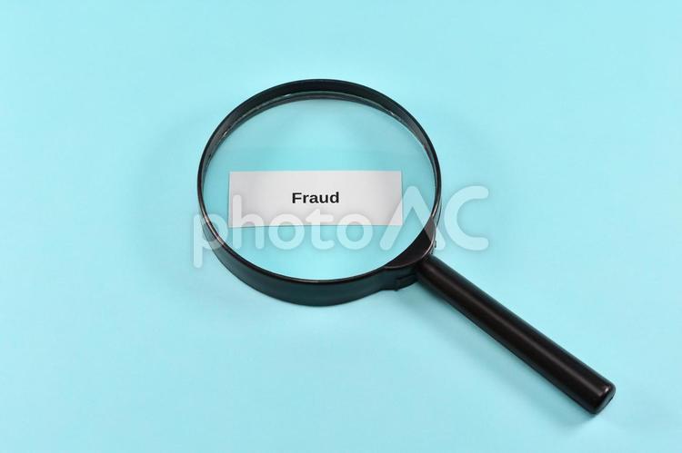 不正を調べるイメージ fraud,不正,虫眼鏡の写真素材