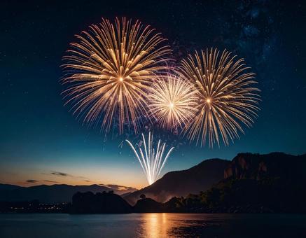 島から上がる花火と夜空と海 島から上がる花火と夜空と海の写真