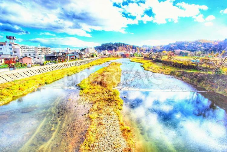色を強調した川面 川面,映る,大空の写真素材