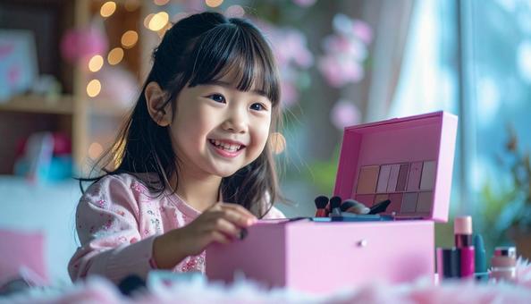 子供用のメイクボックスとメイクする女の子の写真