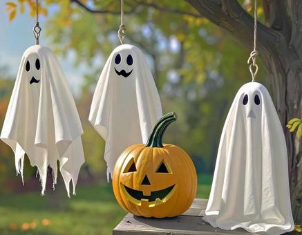 ハロウィンお化けの飾りとカボチャ ハロウィンお化けの飾りとカボチャの写真