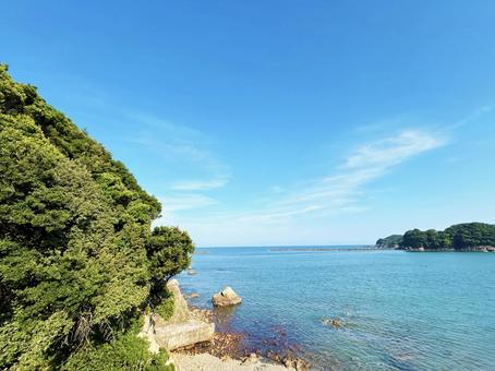 晴れた日の穏やかな海と空模様 晴れた日の穏やかな海と空模様の写真