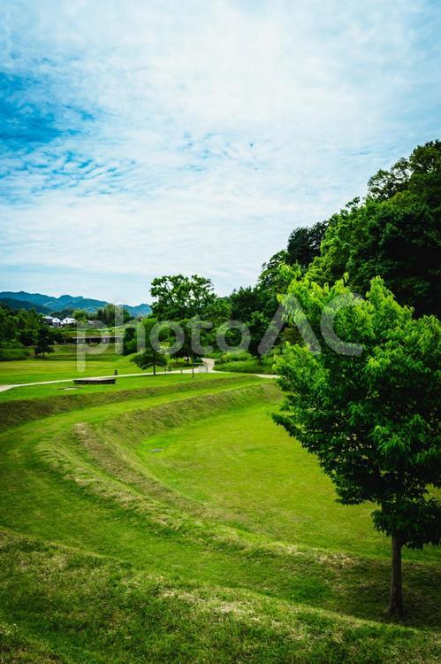 【奈良県】明日香村の古墳公園と青空 奈良,明日香村,牽牛子塚古墳の写真素材