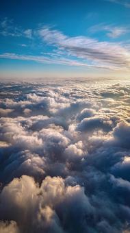 青空と綿雲の広がる壮大な雲海 青空と綿雲の広がる壮大な雲海の写真