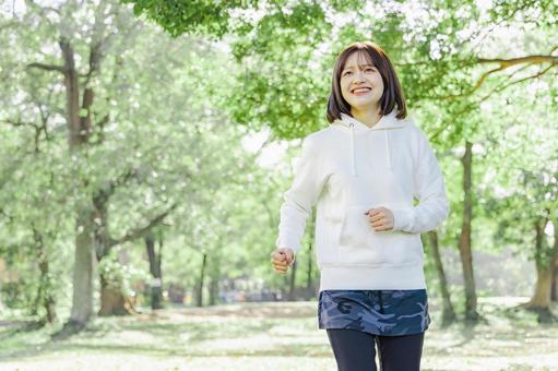 運動　ジョギング　ランニング 女性,人物,ジョギングの写真素材