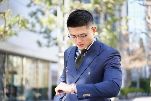 Asian businessman checking the time, male, businessman, late, JPG