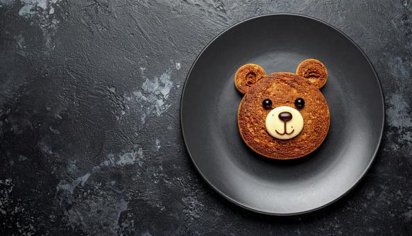 熊の顔のパン、コピースペース 熊の顔のパン、コピースペースの写真