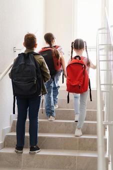 階段を登る生徒たちの後ろ姿 男の子,女の子,子どもの写真素材
