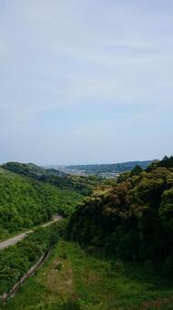 山あいに広がる緑の風景 山,風景,緑の写真素材