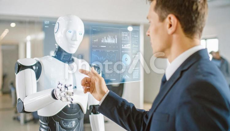 人と機械の協働商談シーン ビジネス,ai,ロボットの写真素材
