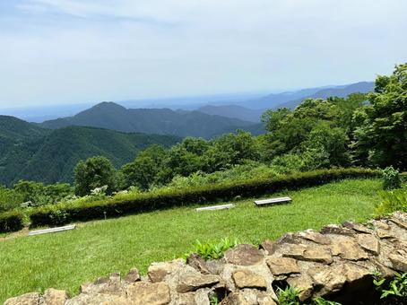 山頂の草原から望む遠くの山並み 山,草原,緑の写真素材