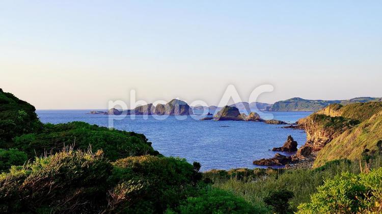 長崎県壱岐市猿岩がある場所から見える風景 猿岩,海,空の写真素材