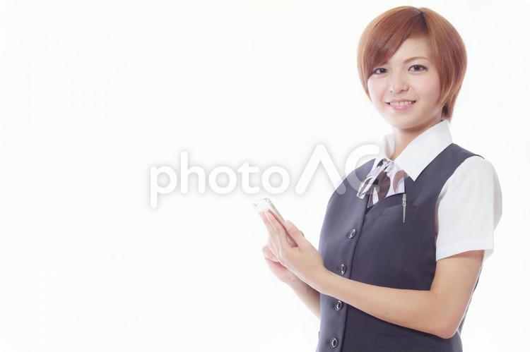 スマホを使うビジネスウーマン 女性,人物,スマホの写真素材