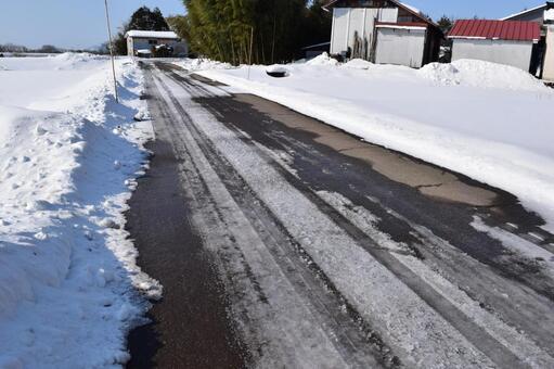 雪道のわだち 雪道の轍,轍,タイヤ跡の写真素材