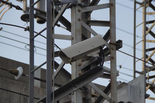 踏切の監視カメラ 踏切信号,鉄道設備,架線の写真素材