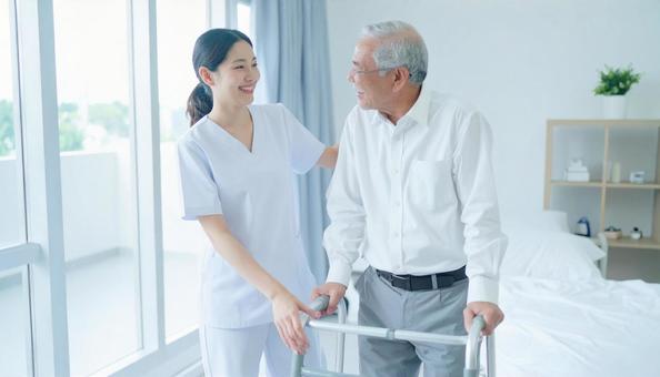 リハビリする患者と理学療法士の写真