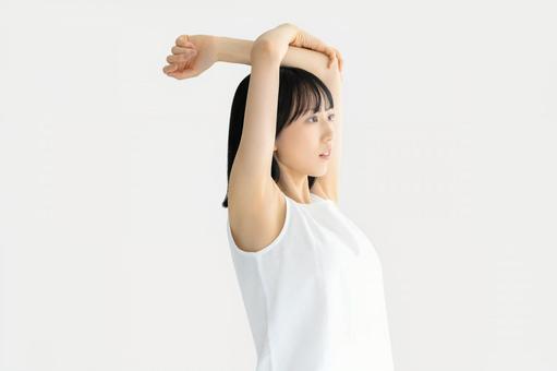 ストレッチをする若い女性 女性,ストレッチ,美容の写真素材