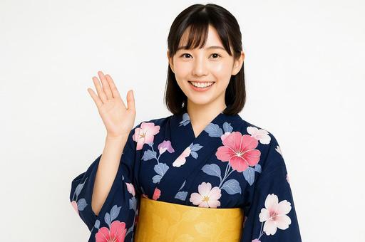 白背景で挨拶する浴衣女性 白背景で挨拶する浴衣女性の写真