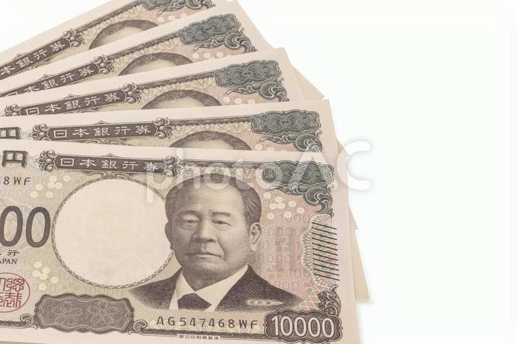 5枚の新一万円札のクローズアップ 新紙幣,五万円,一万円札の写真素材