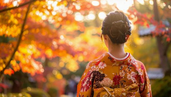 紅葉を眺める晴れ着姿の女性のポートレートの写真