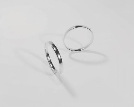 輝くペアリングの3DCG 結婚指輪,指輪,リングの写真素材