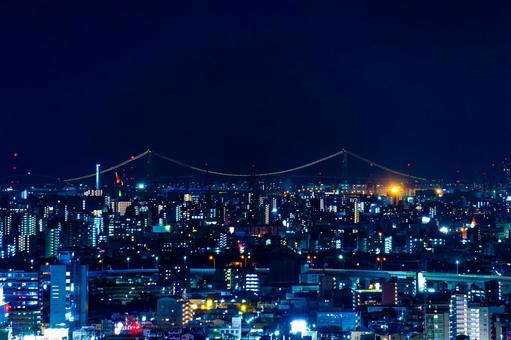 生駒山中腹から見た明石海峡大橋の夜景 生駒山中腹から見た明石海峡大橋の夜景 明石海峡大橋,都市,都会の写真素材