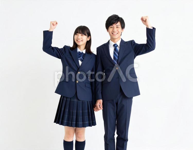 ガッツポーズでエールを送る男女高校生 高校生,男女,生徒の写真素材