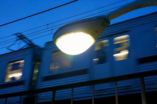 Street lights and trains at dusk, JPG Street lights and trains at dusk, JPG