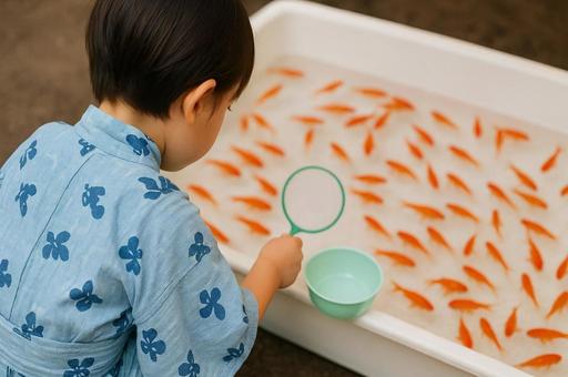 金魚すくいを楽しむ子供・夏祭り・屋台遊び 金魚すくいを楽しむ子供・夏祭り・屋台遊びの写真