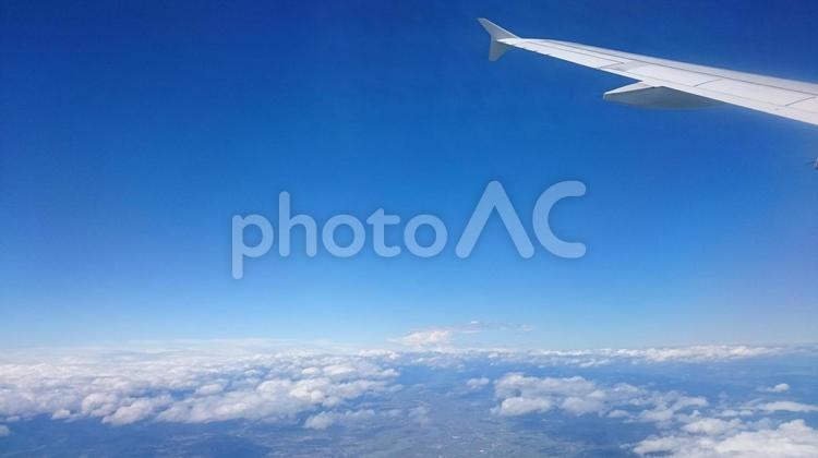 飛行機の中から見た空4 空,雲,青空の写真素材